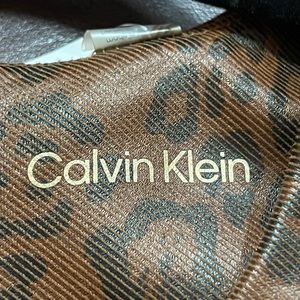 50% Sale today only. Faux leather-like CK high quality bodycon dress, size 6.